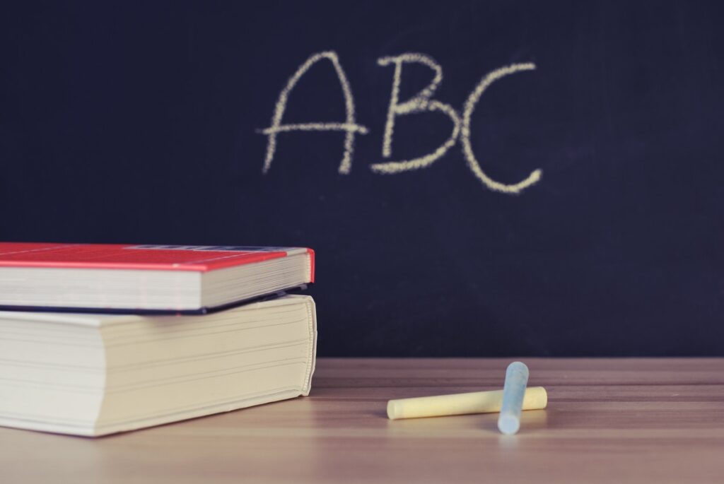 Books, chalk, chalkboard